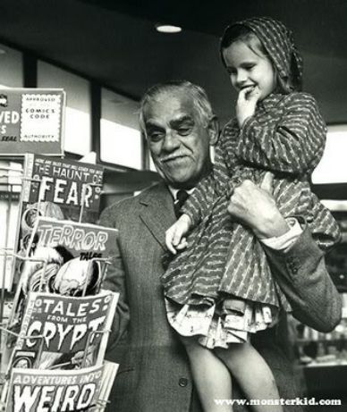 Happy Karloff at comic stand with little girl